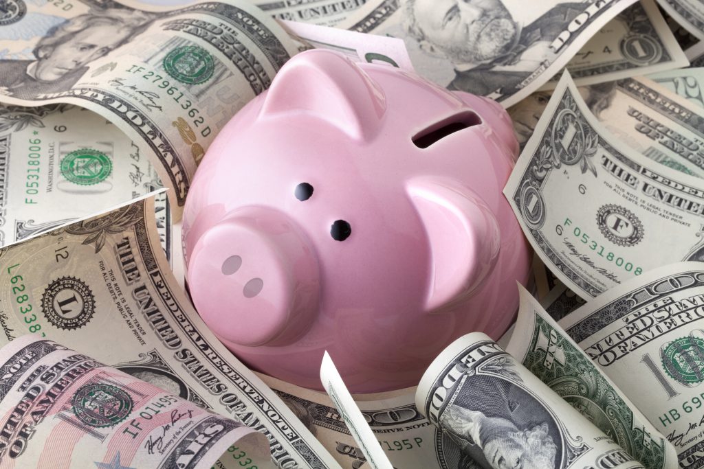 piggy bank with dollars